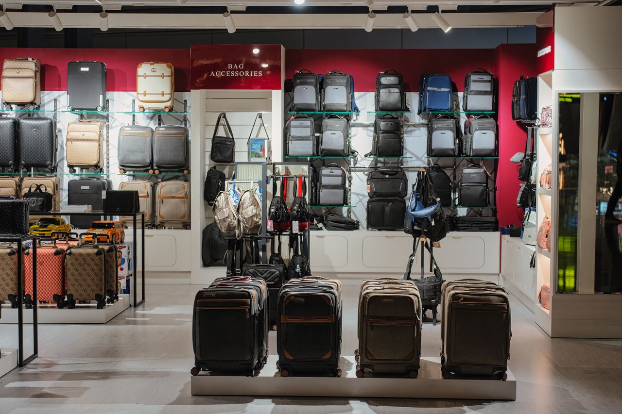 services-04 Elegant luggage display in a premium Doha airport shop, Qatar.